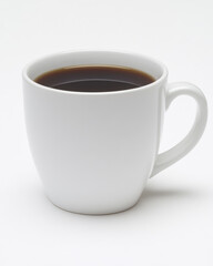 Freshly brewed coffee in a simple white cup on a plain background