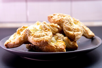 puff pastry with cream cheese and sesame. Baking concept. Homemade food. Baking cakes in the oven.