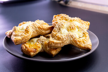 puff pastry with cream cheese and sesame. Baking concept. Homemade food. Baking cakes in the oven.