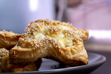 puff pastry with cream cheese and sesame. Baking concept. Homemade food. Baking cakes in the oven.