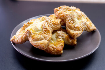 puff pastry with cream cheese and sesame. Baking concept. Homemade food. Baking cakes in the oven.