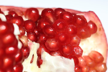 Open pomegranate displaying its seeds