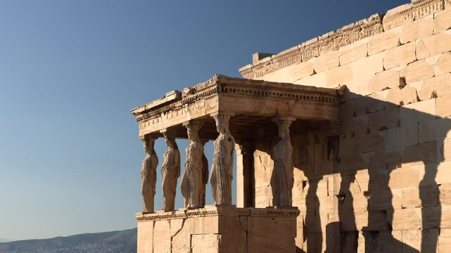 Visit Acropolis hill and the temple of Parthenon. Beautiful 4k video during a sunny day with this heritage landmark of Greek history from Athens. Travel to Greece.