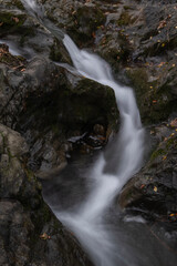 Waterfall. Long exposure waterfall photo. Transference. Long exposure. Long exposure photo of smooth waterfall flowing down steps. Artemea road. Artemea trekking route. Balıkesir, Türkiye.