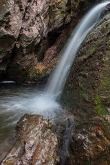 Waterfall. Long exposure waterfall photo. Transference. Long exposure. Long exposure photo of smooth waterfall flowing down steps. Artemea road. Artemea trekking route. Balıkesir, Türkiye.
