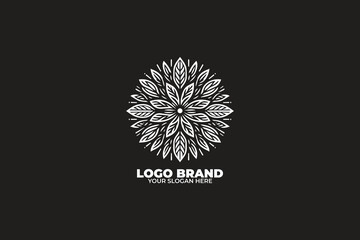 A circular leaf design with intricate lines radiating outward