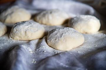 Put the dough on the table