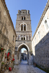 A narrow street between the houses of old Caserta, a medieval village in Italy.