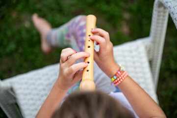 A Melodic Moment: Playing the Flute © Gajus