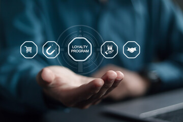 Loyalty program concept, Businessman using laptop with loyalty program icon on virtual screen....