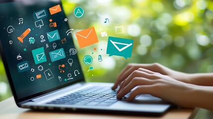 A person using a laptop computer with hologram icons