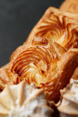 Freshly baked pastries showcasing intricate layers and textures, perfect for any dessert lover