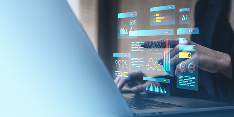 Interactive digital interface over laptop with data visualization.