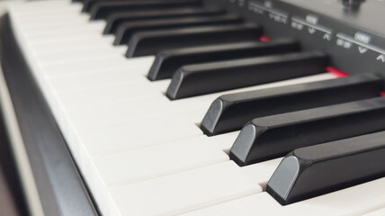 music and saving concept with piano and piggy bank