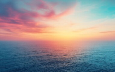 Obraz premium Vibrant sunset over calm ocean.