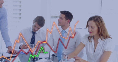 Image of financial data processing over diverse business people in meeting in office