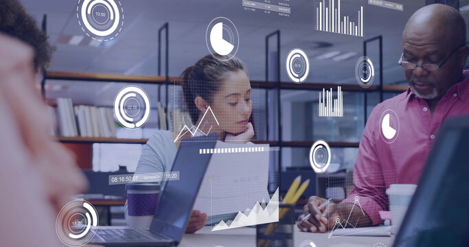 Image of financial data processing over diverse colleagues discussing work in office