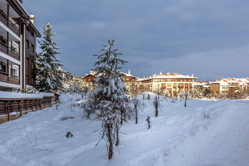 Fototapeta premium Bansko, Bulgaria winter street view and mountains