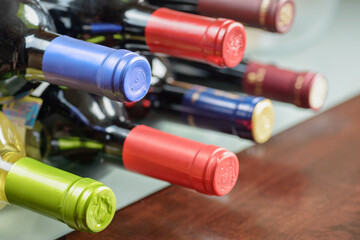Closeup view of wine bottle necks