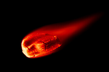 a burning meteorite with a tail of flames.