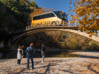 Papigo Adrenaline Voidomatis River Meeting Point

Tourist bus on an extreme bridge over the...