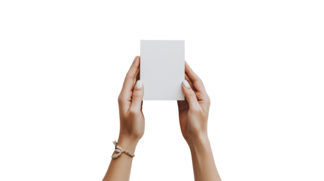 A pair of female hands delicately hold a blank white rectangular card against a black background providing a clean mockup for various applications.