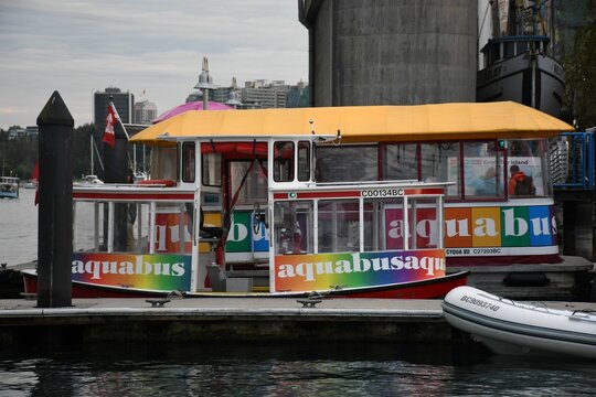 Colorful aquabus boats at sunset in Vancouver