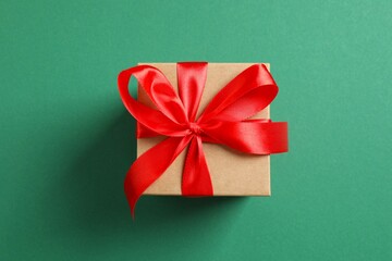 Beautiful gift box on color background