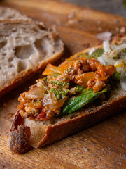 Sliced Artisan Sourdough Bread on Wooden Table.