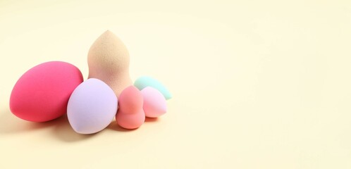 Beauty blender on a color background. Bright sponges for make-up cosmetics. Make-up products. Beauty concept