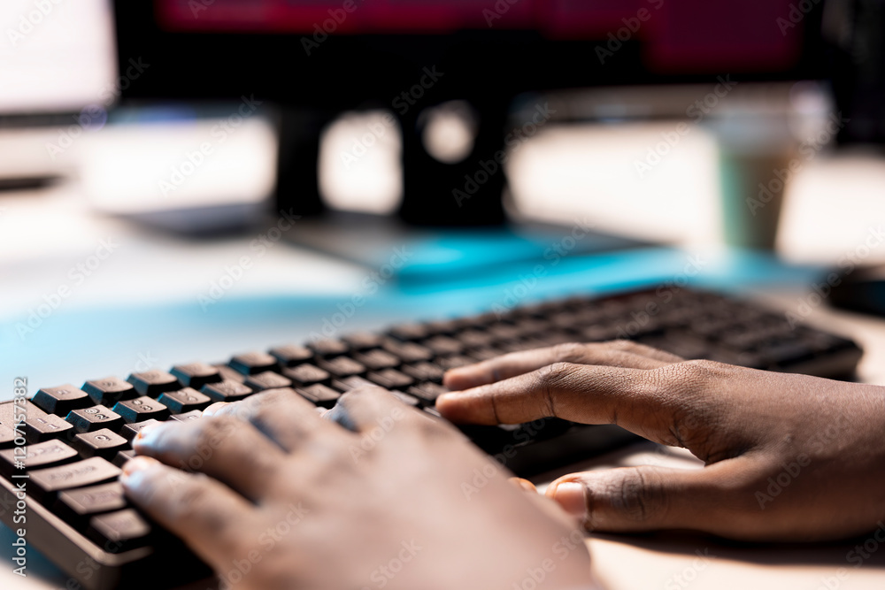 Poster technician in data center typing on keyboard, using diagnostic tools and system monitoring software 