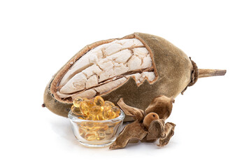 Dried baobab fruit ,seeds and oil isolated on white background.