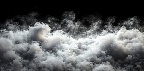 Fototapeta premium White smoke billowing from a black background.