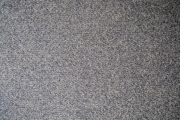 Soft grey carpet texture enhances modern interior aesthetic