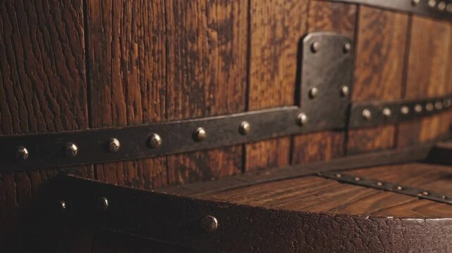Fresh green hops on wooden barrel, rustic brewery setting. Craft beer brewing concept