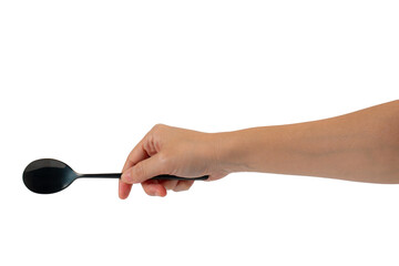Hand and metal black spoon on transparent background