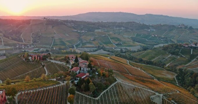 Aerial view of the hills with vineyards in autumn, Le Langhe wine region, Piedmont, Italy