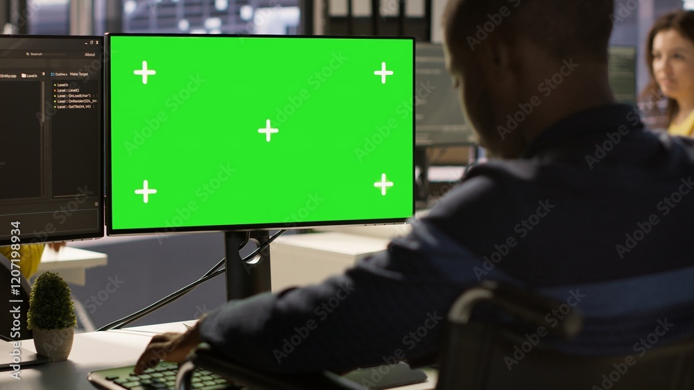 Poster man with disability in inclusive workplace working with machine learning tech on green screen comput