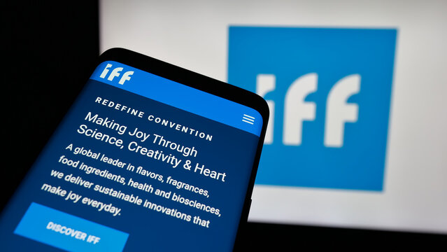 Stuttgart, Germany - 01-17-2025: Smartphone with website of US company International Flavors Fragrances Inc. (IFF) on screen in front of logo. Focus on top-left of phone display.