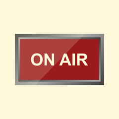 Red sign with a black frame with yellow writing that says 'ON AIR,' on a yellow background.