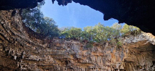 Melissani lake cave the hole seen from inside the cave, Kefalonia island Greece 