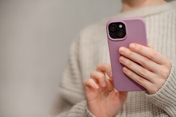 shot of woman looking at phone. Woman using technology. Technology content
