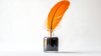 A quill rests in an inkwell against a white background for vintage writing and calligraphy concept.