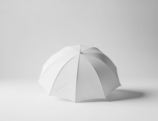 3D rendered white umbrella on a white background, simple shot.
