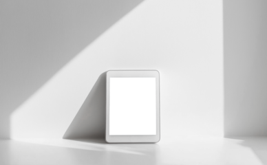 Digital tablet mockup screen isolated transparent PNG over white wall background. Tablet with blank empty white mock up display for website design, app and advertisement