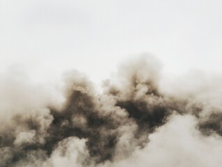Dramatic Dark Smoke Cloud Formation Against a Light Sky Background Abstract Texture