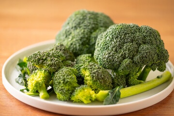 Fresh broccoli on the table.
