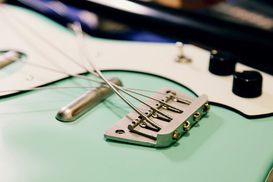 Bass guitar luthier workshop highlighting crafting details