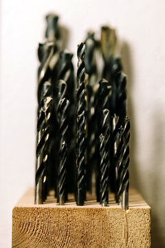 Tools and drill bits in a bass guitar luthier's workshop