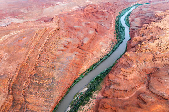 Aerial view of Rio San Juan winding through Utah's red landscape